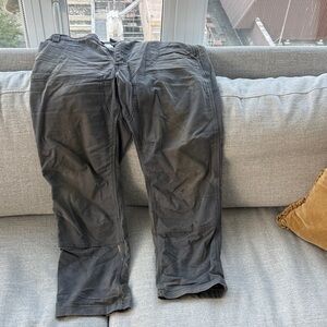 Carhartt Men's Dark Gray Cargo Pants well worn in.